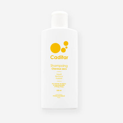 CADITAR Champú Cabello Seco  con extractos de uva e ylang ylang para aumentar la hidratación del cuero cabelludo.  Una triple acción sobre el cuero cabelludo:  Nutrido Fortalece Hidratar